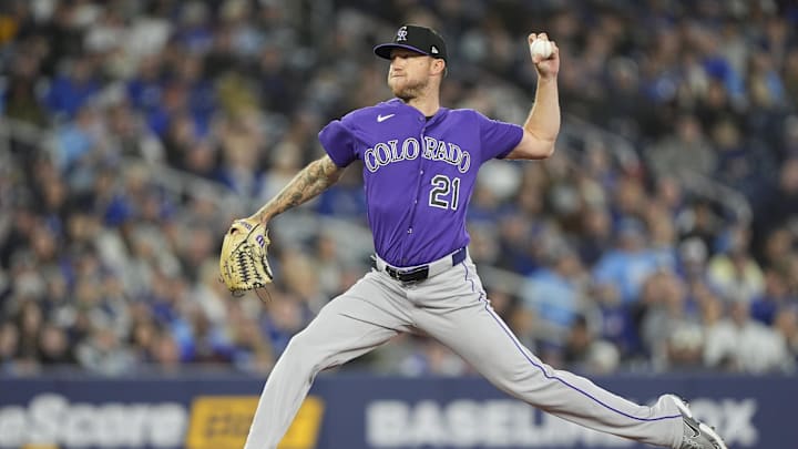 Apr 1, 2026; Toronto, Ontario, CAN; Colorado Rockies starting pitcher Kyle Freeland (21) pitches to the Toronto Blue Jays during the second inning at Rogers Centre. Mandatory Credit: John E. Sokolowski-Imagn Images