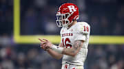 Dec 26, 2024; Phoenix, AZ, USA; Rutgers Scarlet Knights quarterback Athan Kaliakmanis (16) reacts against the Kansas State Wildcats during the second half of the Rate Bowl at Chase Field. Mandatory Credit: Mark J. Rebilas-Imagn Images