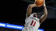 Nov 10, 2023; Cincinnati, Ohio, USA;  Cincinnati Bearcats guard CJ Anthony (11) drives to the basket against the Detroit Mercy Titans in the second half at Fifth Third Arena. Mandatory Credit: Aaron Doster-Imagn Images