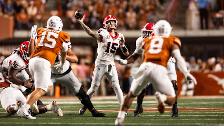Georgia Bulldogs quarterback Carson Beck drops back to pass against the Texas Longhorns. Georgia Bulldogs quarterback Carson Beck drops back to pass against the Texas Longhorns.