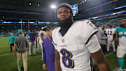 Oct 30, 2025; Miami Gardens, Florida, USA; Baltimore Ravens quarterback Lamar Jackson (8) walks off the field after a win over Miami Dolphins at Hard Rock Stadium. Mandatory Credit: Sam Navarro-Imagn Images