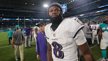 Oct 30, 2025; Miami Gardens, Florida, USA; Baltimore Ravens quarterback Lamar Jackson (8) walks off the field after a win over Miami Dolphins at Hard Rock Stadium. Mandatory Credit: Sam Navarro-Imagn Images