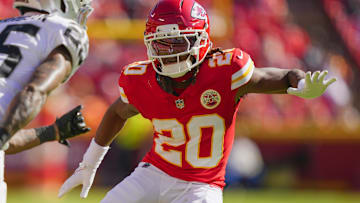 Oct 19, 2025; Kansas City, Missouri, USA; Kansas City Chiefs cornerback Nohl Williams (20) defends Las Vegas Raiders cornerback Decamerion Richardson (25) during the second half at GEHA Field at Arrowhead Stadium.