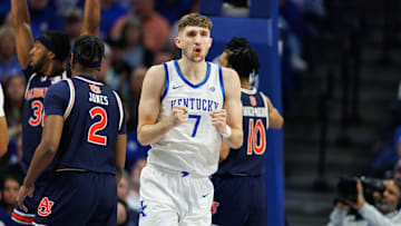 Mar 1, 2025; Lexington, Kentucky, USA; Kentucky Wildcats forward Andrew Carr (7) reacts after being fouled during the first half against the Auburn Tigers at Rupp Arena at Central Bank Center. Mandatory Credit: Jordan Prather-Imagn Images