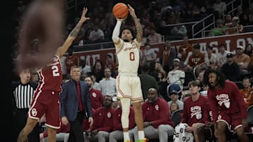 Mar 8, 2025; Austin, Texas, USA; Texas Longhorns guard Jordan Pope (0) shoots during the first half against the Oklahoma Sooners at Moody Center. Mandatory Credit: Scott Wachter-Imagn Images
