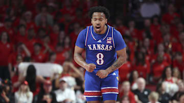 Mar 3, 2025; Houston, Texas, USA; Kansas Jayhawks guard David Coit (8) reacts after making a basket during the first half against the Houston Cougars at Fertitta Center. Mandatory Credit: Troy Taormina-Imagn Images