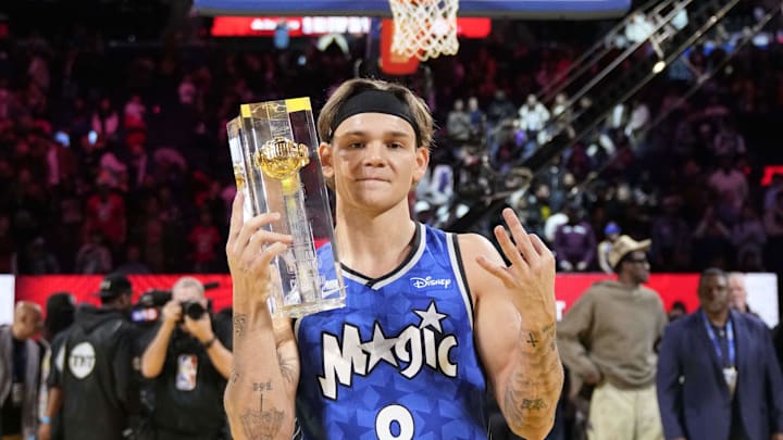 Feb 15, 2025; San Francisco, CA, USA; Osceola Magic guard Mac McClung celebrates with the trophy after winning the slam dunk competition during All Star Saturday Night ahead of the 2025 NBA All Star Game at Chase Center. Mandatory Credit: Kyle Terada-Imagn Images