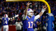 Buffalo Bills quarterback Josh Allen (17) celebrates with fans after his 81 yard touchdown pass to Buffalo Bills wide receiver Khalil Shakir (10).