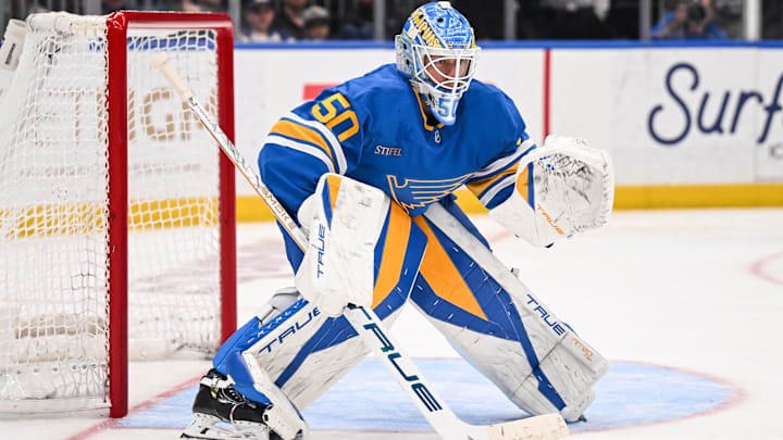 Apr 14, 2026; St. Louis, Missouri, USA; St. Louis Blues goaltender Jordan Binnington (50) defends the net during the third period against the Pittsburgh Penguins at Enterprise Center. Mandatory Credit: Connor Hamilton-Imagn Images