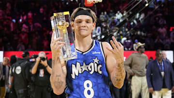 Feb 15, 2025; San Francisco, CA, USA; Osceola Magic guard Mac McClung celebrates with the trophy after winning the slam dunk competition during All Star Saturday Night ahead of the 2025 NBA All Star Game at Chase Center. Mandatory Credit: Kyle Terada-Imagn Images