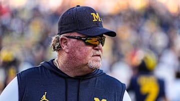 Michigan defensive coordinator Wink Martindale watches warm up ahead of the New Mexico game at Michigan Stadium in Ann Arbor on Saturday, August 30, 2025.