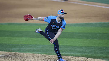 Jul 16, 2024; Arlington, Texas, USA; National League pitcher Tanner Scott of the Miami Marlins (66) pitches in the eight inning during the 2024 MLB All-Star game at Globe Life Field. 