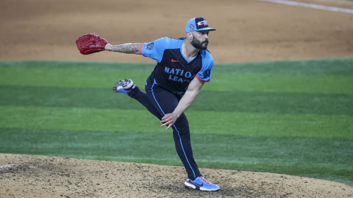 Jul 16, 2024; Arlington, Texas, USA; National League pitcher Tanner Scott of the Miami Marlins (66) pitches in the eight inning during the 2024 MLB All-Star game at Globe Life Field. Mandatory Credit: Tim Heitman-USA TODAY Sports