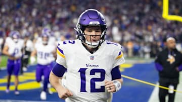 Jan 13, 2025; Glendale, AZ, USA; Minnesota Vikings quarterback Nick Mullens (12) against the Los Angeles Rams during an NFC wild card game at State Farm Stadium. Mandatory Credit: Mark J. Rebilas-Imagn Images