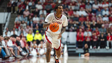 Feb 25, 2025; Tuscaloosa, Alabama, USA; Alabama Crimson Tide guard Labaron Philon (0) drives against the Mississippi State Bulldogs during the second half at Coleman Coliseum. Mandatory Credit: Will McLelland-Imagn Images