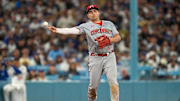 Cincinnati Reds third baseman Sal Stewart (43) plays a ground ball off the bat of Los Angeles Dodgers first baseman Enrique Hernandez (8) in the eighth inning of the MLB National League Wild Card Game 2 between the Los Angeles Dodgers and the Cincinnati Reds at Dodger Stadium in Los Angeles on Wednesday, Oct. 1, 2025. The Reds were eliminated from the postseason with an 8-4 loss to the reining World Series Champions La Dodgers.