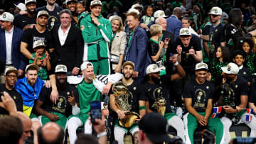 Jun 17, 2024; Boston, Massachusetts, USA; The Boston Celtics celebrates after beating the Dallas Mavericks in game five of the 2024 NBA Finals to the NBA Championship at TD Garden. Mandatory Credit: Peter Casey-USA TODAY Sports