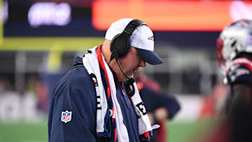 August 8, 2024; Foxborough, MA, USA;  New England Patriots offensive coordinator Alex Van Pelt  checks his play card during the first half against the Carolina Panthers at Gillette Stadium. Mandatory Credit: Eric Canha-Imagn Images