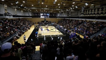 Purdue fans watch during an NCAA volleyball match 