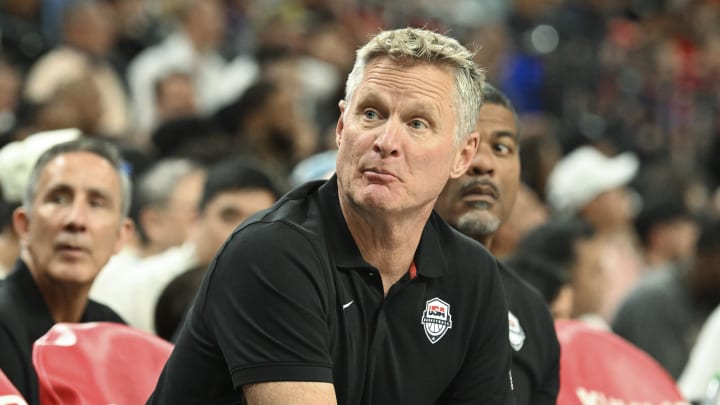 Jul 10, 2024; Las Vegas, Nevada, USA; USA head coach Steve Kerr speaks to a player on the bench in the fourth quarter against Canada in the USA Basketball Showcase at T-Mobile Arena.