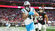 Nov 16, 2025; Atlanta, Georgia, USA; Carolina Panthers wide receiver Tetairoa McMillan (4) catches the ball for a touchdown in the fourth quarter against the Atlanta Falcons at Mercedes-Benz Stadium. Mandatory Credit: Brett Davis-Imagn Images