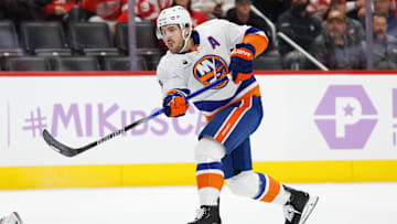 Nov 20, 2025; Detroit, Michigan, USA;  New York Islanders defenseman Ryan Pulock (6) takes a shot in the first period against the Detroit Red Wings at Little Caesars Arena. Mandatory Credit: Rick Osentoski-Imagn Images