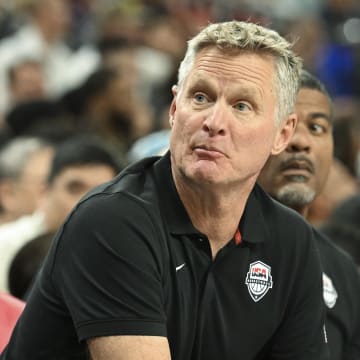 Jul 10, 2024; Las Vegas, Nevada, USA; USA head coach Steve Kerr speaks to a player on the bench in the fourth quarter against Canada in the USA Basketball Showcase at T-Mobile Arena. Mandatory Credit: Candice Ward-USA TODAY Sports