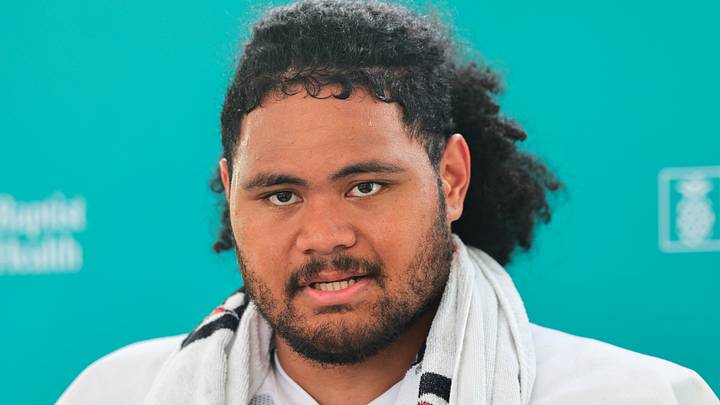 Miami Dolphins guard Jonah Savaiinaea