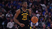 Apr 9, 2025; San Francisco, California, USA;  Golden State Warriors forward Jonathan Kuminga (00) dribbles upcourt against the San Antonio Spurs in the second period at Chase Center. Mandatory Credit: David Gonzales-Imagn Images