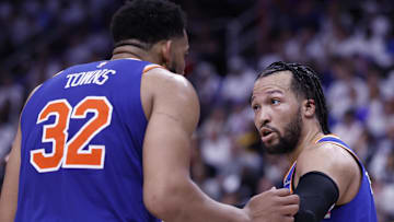 May 1, 2025; Detroit, Michigan, USA; New York Knicks guard Jalen Brunson (11) talks to center Karl-Anthony Towns (32) in the second half against the Detroit Pistons during game six of first round for the 2024 NBA Playoffs at Little Caesars Arena. Mandatory Credit: Rick Osentoski-Imagn Images