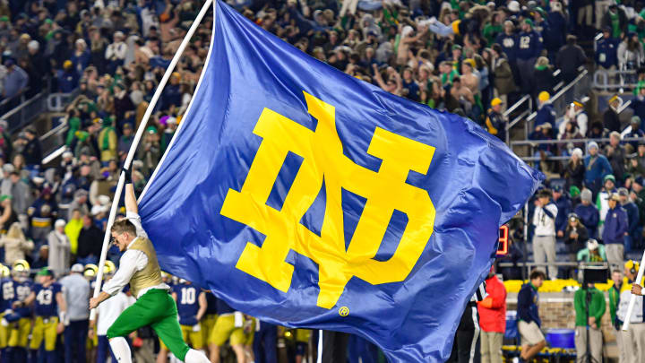 Oct 23, 2021; South Bend, Indiana, USA; The Notre Dame Leprechaun carries a Notre Dame monogram flag after a Notre Dame touchdown in the fourth quarter against the USC Trojans at Notre Dame Stadium. 