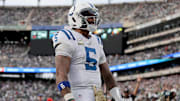 Nov 17, 2024; East Rutherford, New Jersey, USA; Indianapolis Colts quarterback Anthony Richardson (5) celebrates his touchdown against the New York Jets during the fourth quarter at MetLife Stadium. Mandatory Credit: Brad Penner-Imagn Images