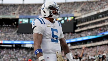 Nov 17, 2024; East Rutherford, New Jersey, USA; Indianapolis Colts quarterback Anthony Richardson (5) celebrates his touchdown against the New York Jets during the fourth quarter at MetLife Stadium. Mandatory Credit: Brad Penner-Imagn Images