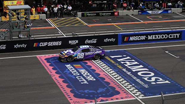 Trackhouse Racing driver Shane Van Gisbergen crosses the finish line to win the NASCAR Cup Series Mexico City Race.