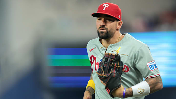 Sep 7, 2025; Miami, Florida, USA; Philadelphia Phillies right fielder Nick Castellanos (8) returns to the dugout against the Miami Marlins during the fifth inning at loanDepot Park.