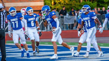 Detroit Catholic Central's Samson Gash celebrates a touchdown during a football game on Friday, Aug. 29, 2025.