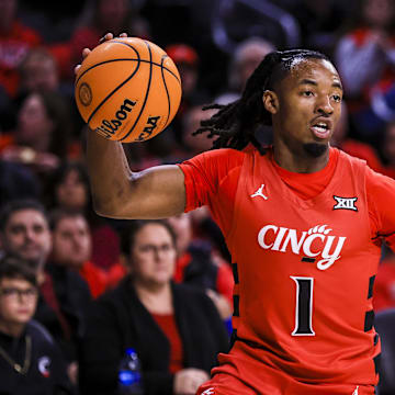 Mar 5, 2025; Cincinnati, Ohio, USA; Cincinnati Bearcats guard Day Day Thomas (1) dribbles against the Kansas State Wildcats in the first half at Fifth Third Arena. Mandatory Credit: Katie Stratman-Imagn Images