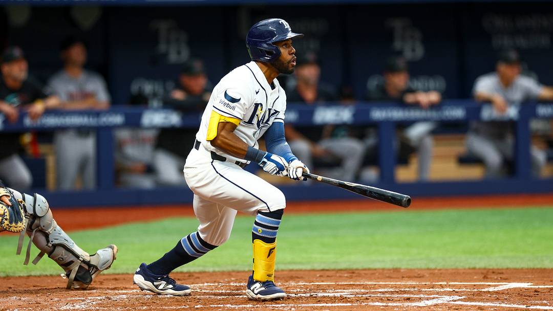 Jun 28, 2026; St. Petersburg, Florida, USA; Tampa Bay Rays center fielder Cedric Mullins (31) hits a home run against the Arizona Diamondbacks in the second inning at Tropicana Field. Mandatory Credit: Nathan Ray Seebeck-Imagn Images
