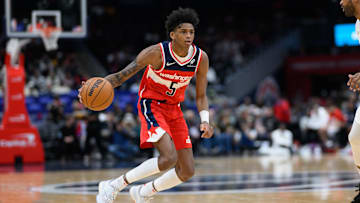 Feb 7, 2025; Washington, District of Columbia, USA; Washington Wizards guard AJ Johnson (5) handles the ball during the second quarter against the Cleveland Cavaliers at Capital One Arena. Mandatory Credit: Reggie Hildred-Imagn Images