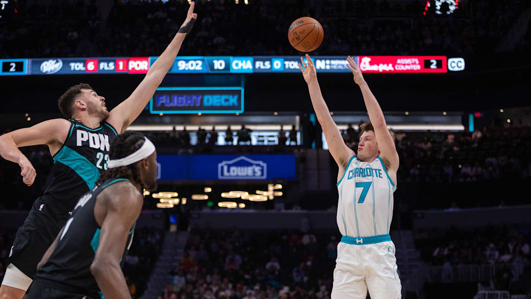 Feb 28, 2026; Charlotte, North Carolina, USA; Charlotte Hornets guard Kon Knueppel (7) shoots the ball against the Portland Trail Blazers during the first quarter at Spectrum Center. Mandatory Credit: Scott Kinser-Imagn Images