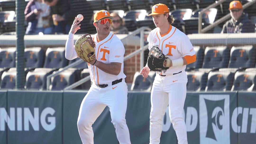 Tennessee first baseman Alberto Osuna (45) tosses the ball up while warming up at the Tennessee baseball season opener against Hofstra, in Lindsey Nelson Stadium at University of Tennessee in Knoxville, Tenn., Friday, February. 14, 2025.