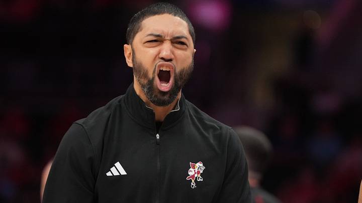 Mar 11, 2026; Charlotte, NC, USA; Louisville Cardinals assistant coach Peyton Siva reacts in the first half at Spectrum Center. Mandatory Credit: Bob Donnan-Imagn Images Mar 11, 2026; Charlotte, NC, USA; Louisville Cardinals assistant coach Peyton Siva reacts in the first half at Spectrum Center. Mandatory Credit: Bob Donnan-Imagn Images