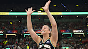 New York Liberty's Sabrina Ionsecu celebrates winning the three-point contest.