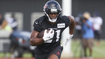 Jul 23, 2025; Houston, TX, USA;  Houston Texans running back Nick Chubb (21) during training camp at Houston Methodist Training Center. Mandatory Credit: Troy Taormina-Imagn Images