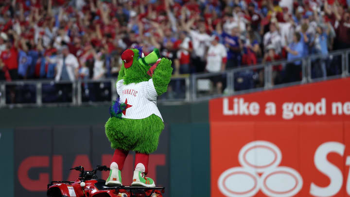 Oct 3, 2023; Philadelphia, Pennsylvania, USA; Philadelphia Phillies mascot, Phillie Phanatic reacts with the crowd  before game one of the Wildcard series for the 2023 MLB playoffs against the Miami Marlins at Citizens Bank Park.