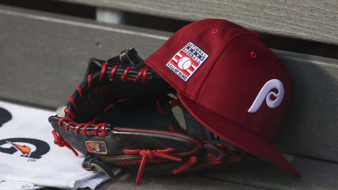 Jul 25, 2025; Bronx, New York, USA; A detailed view of a Hall of Fame patch on a Philadelphia Phillies hat resting in the dugout during the second inning against the New York Yankees at Yankee Stadium. Mandatory Credit: Vincent Carchietta-Imagn Images Jul 25, 2025; Bronx, New York, USA; A detailed view of a Hall of Fame patch on a Philadelphia Phillies hat resting in the dugout during the second inning against the New York Yankees at Yankee Stadium. Mandatory Credit: Vincent Carchietta-Imagn Images
