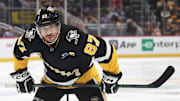 Apr 8, 2025; Pittsburgh, Pennsylvania, USA;  Pittsburgh Penguins center Sidney Crosby (87) prepares to take a face-off against the Chicago Blackhawks during the third period at PPG Paints Arena. Mandatory Credit: Charles LeClaire-Imagn Images