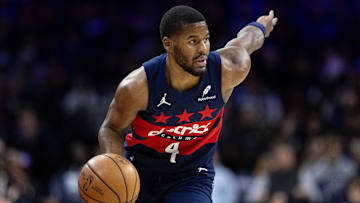 Jan 8, 2025; Philadelphia, Pennsylvania, USA; Washington Wizards guard Jared Butler (4) controls the ball against the Philadelphia 76ers during the second quarter at Wells Fargo Center. Mandatory Credit: Bill Streicher-Imagn Images