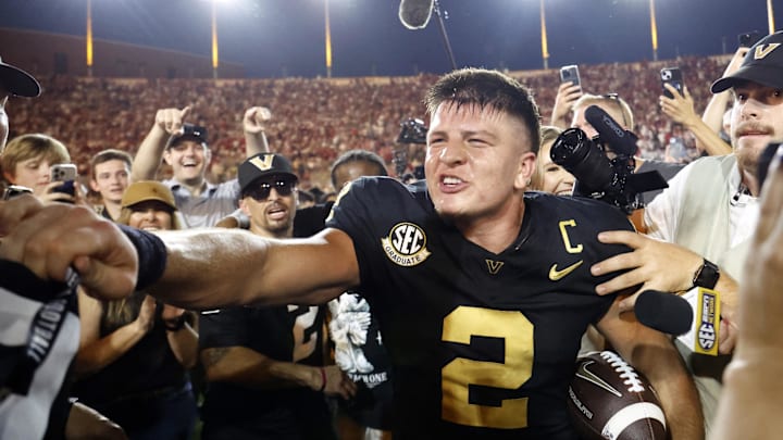 Oct 5, 2024; Nashville, Tennessee, USA;  Vanderbilt Commodores quarterback Diego Pavia celebrates with fans after defeating the Alabama Crimson Tide during the second half at FirstBank Stadium.