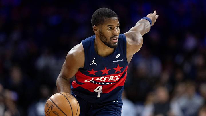 Jan 8, 2025; Philadelphia, Pennsylvania, USA; Washington Wizards guard Jared Butler (4) controls the ball against the Philadelphia 76ers during the second quarter at Wells Fargo Center. Mandatory Credit: Bill Streicher-Imagn Images